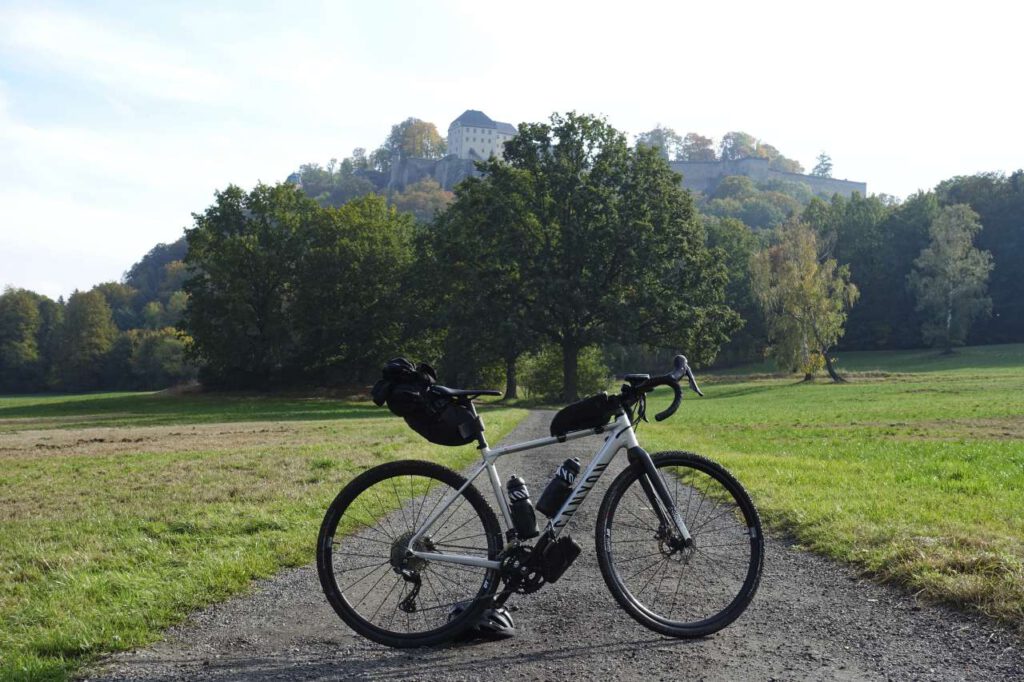Gravel bike in front of Koenigstein Fortress in Saxony Germany