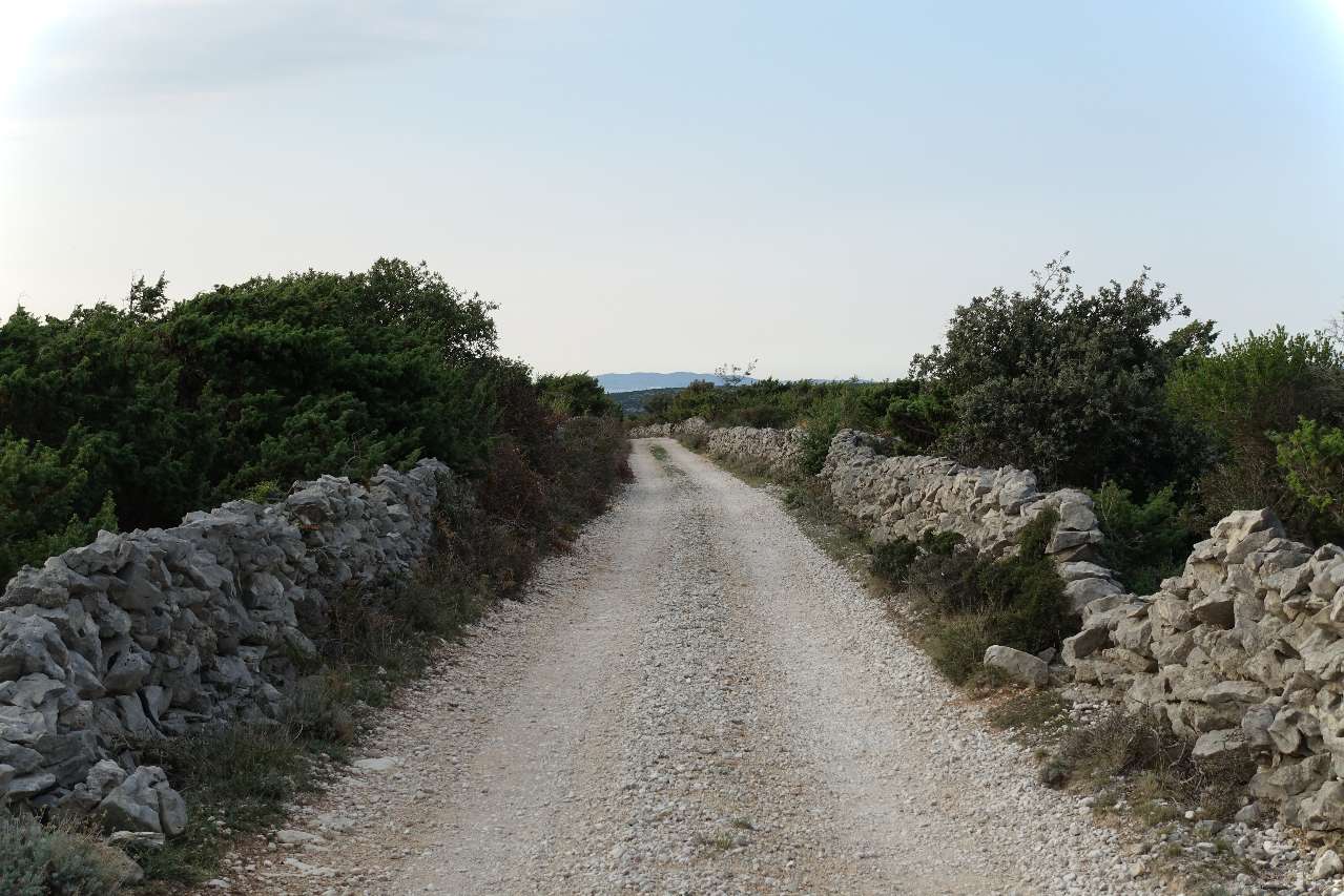 rough gravel road on Cres Island Croatia