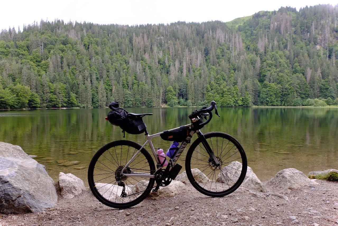 Gravel bike at a small, clear and beautiful lake in Black Forest, Germany