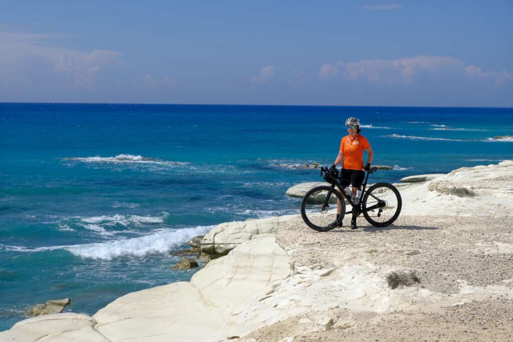 Gravel biker on a cliff in Cyprus