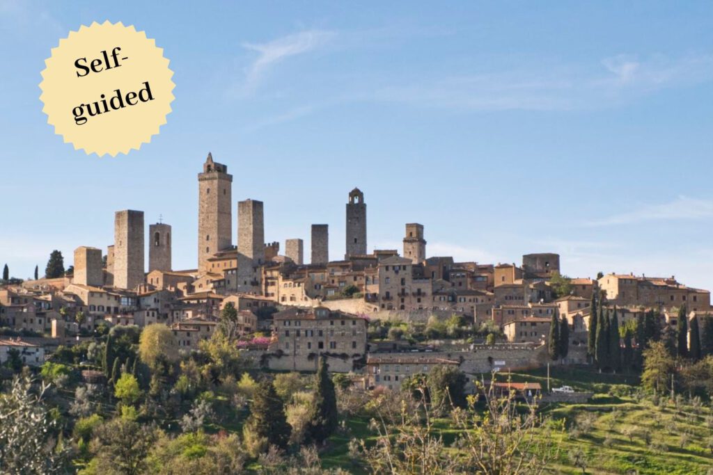 Preview image for a cycle tour through Tuscany. You can see the old town of San Gimignano with its medieval towers.